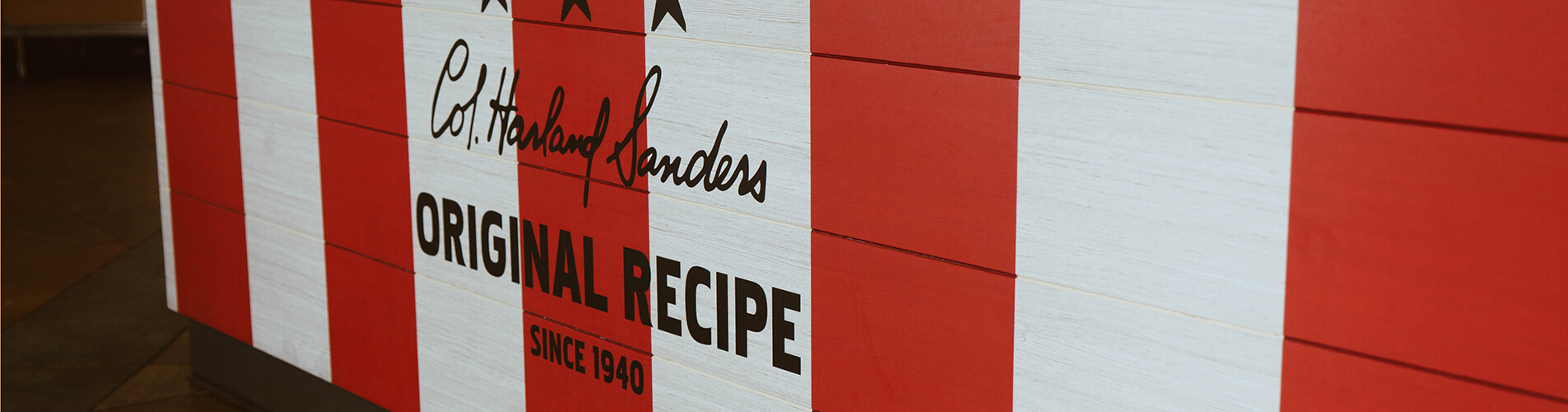 Red and white wall that says "Original Recipe"