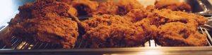 fried chicken on a heat tray